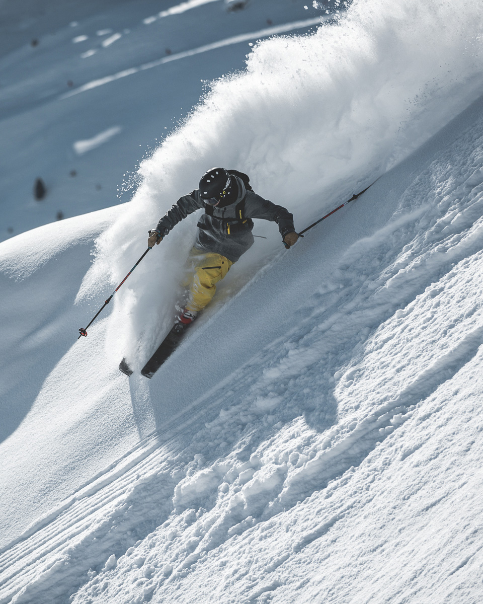 Image of skier coming down a steep mountain